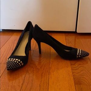 Blue sued high heeled shoes